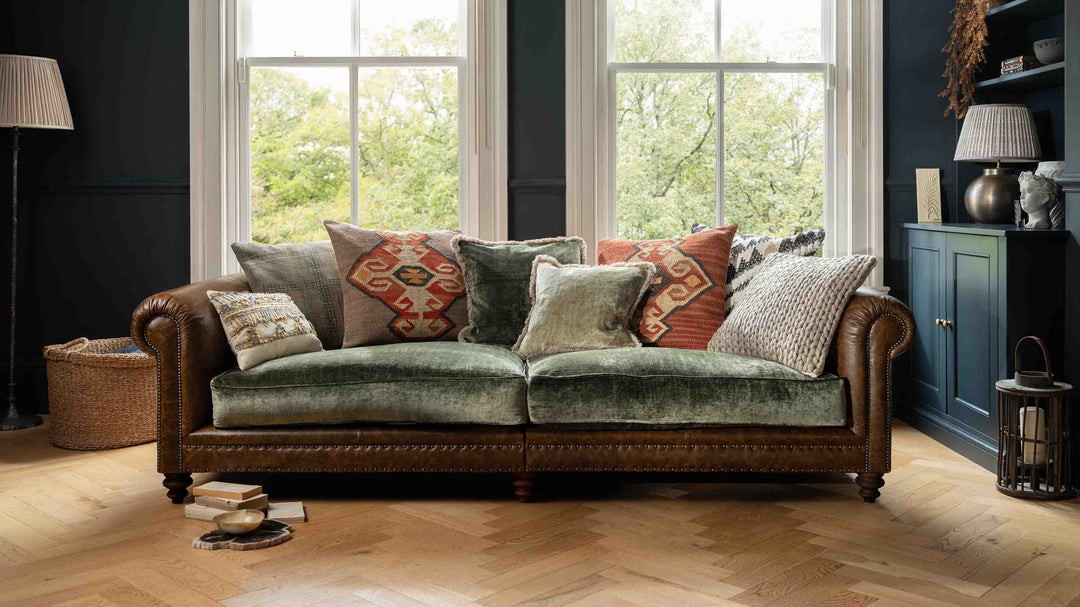leather tetrad sofa in a panelled room