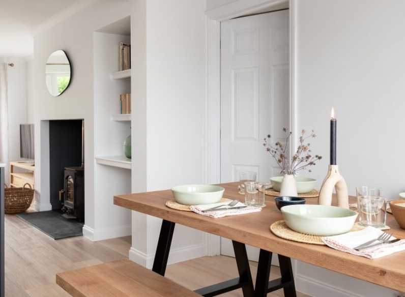 solid oak dining table with a bench in a modern lifestyle 