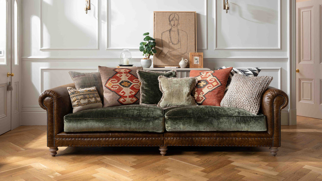 tetrad leather and fabric sofa in a panelled room