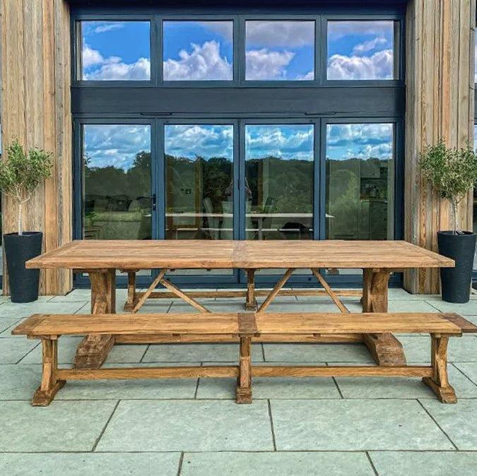 teak outdoor dining table and benches